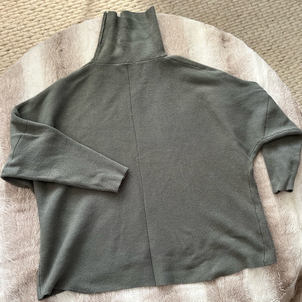 Oversized turtleneck runs big!